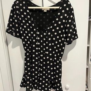 Polka dot black and white flowy romper size medium